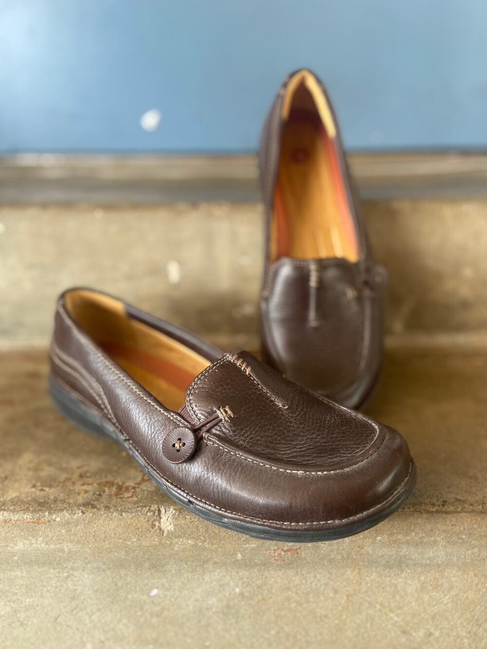 Clarks Unstructured brown leather slip on loafer with button detail